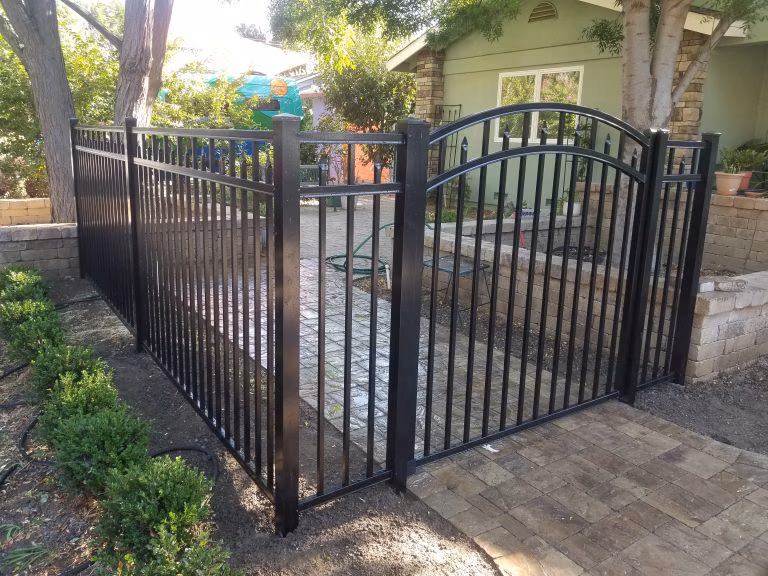 A modern house with a well-maintained exterior, showcasing the quality of residential construction services offered by Cal Vesna Construction Inc.